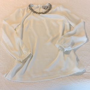 Jewel neck ecru long sleeved blouse